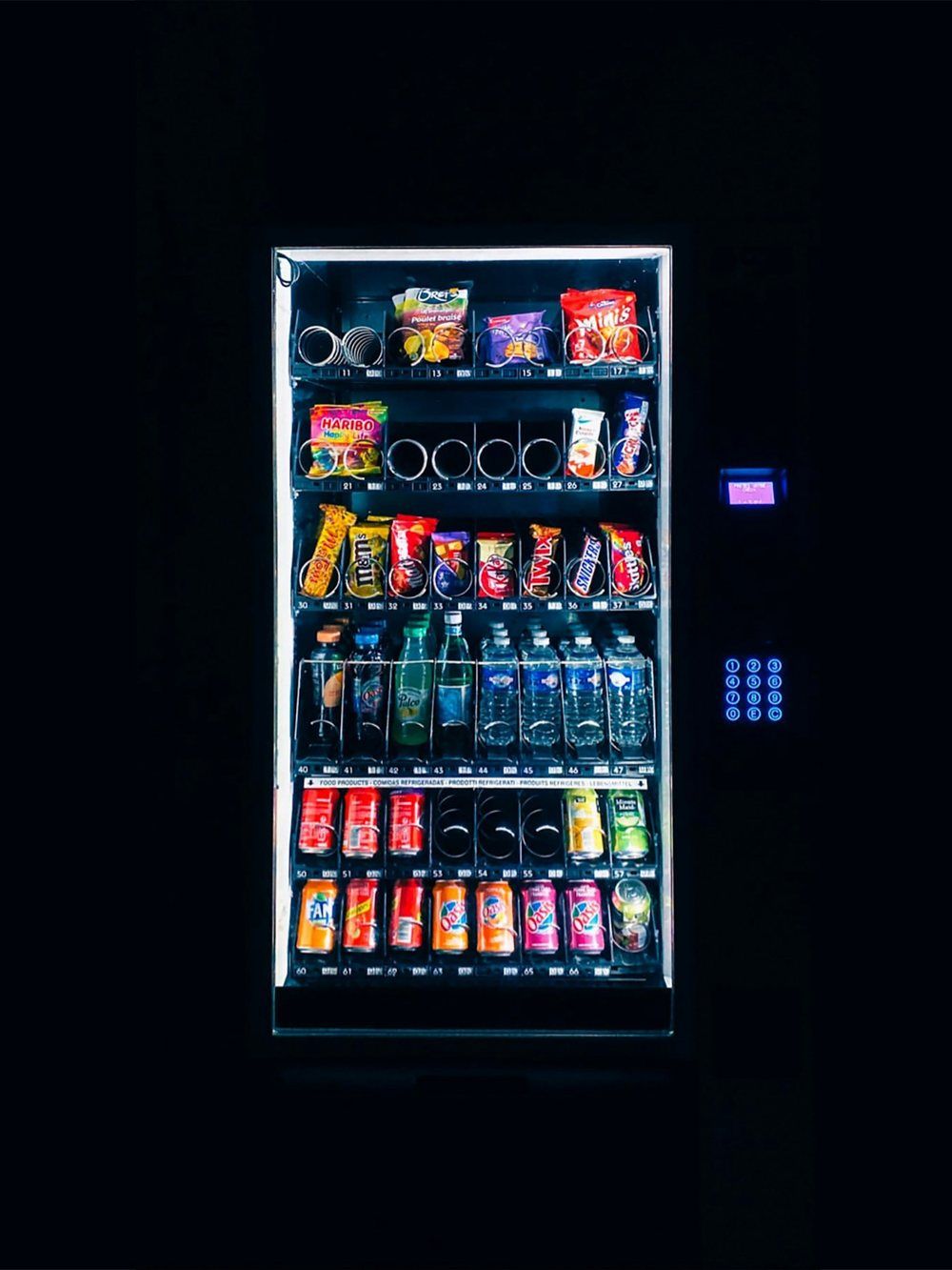 A lit beverage vending machine